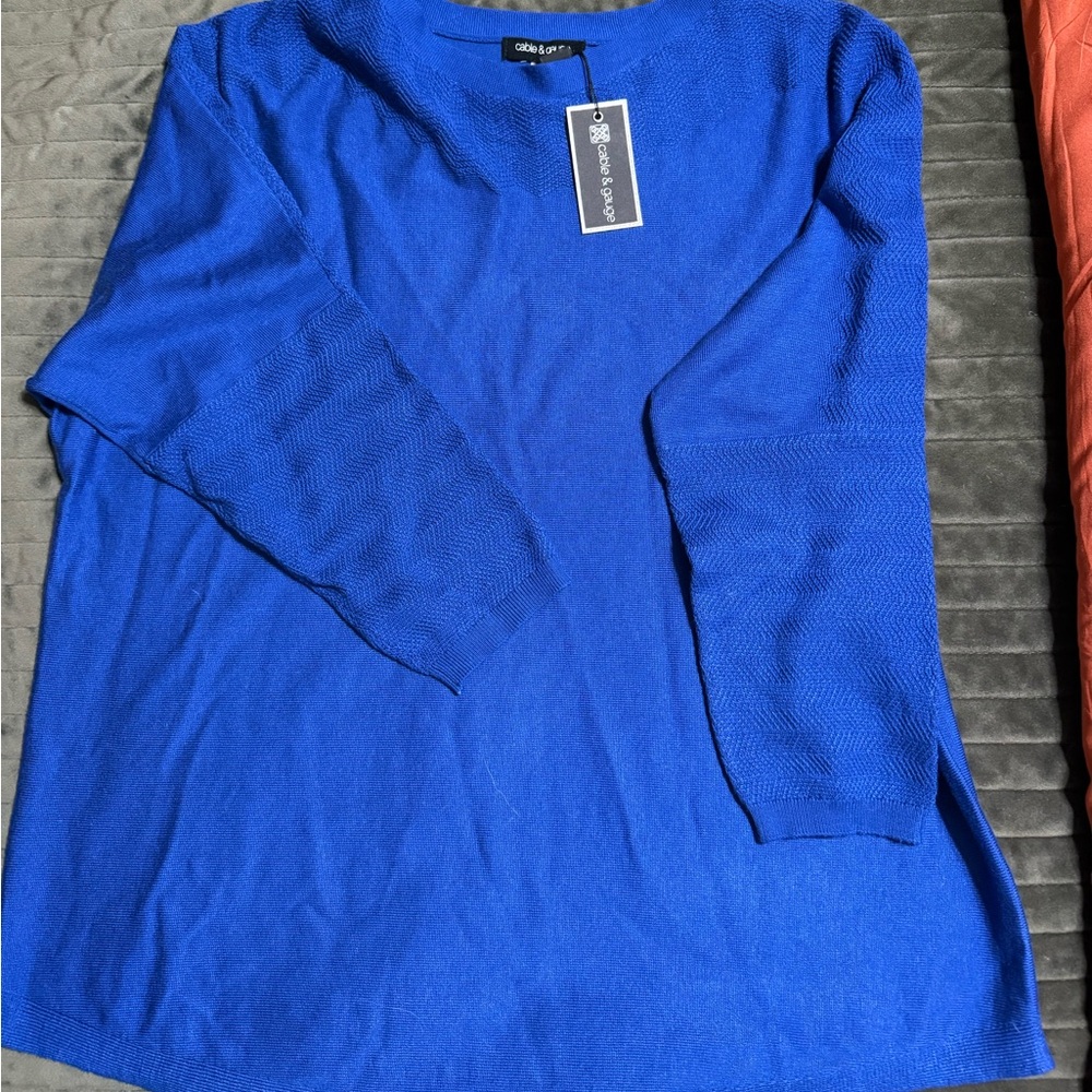 New with tags sweater in a beautiful royal blue color